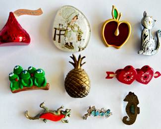 10 Vintage Brooch Pins By Hallmark, Hollie Hobby & More
Lot #: 132