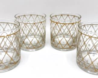 Vintage Cut Crystal Decanter & Set Of 4 Mid-Century Etched Gilded Rock Glasses
Lot #: 45