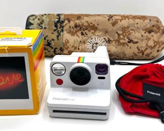 Poloroid Now Camera With 40x Film Pack & Portable Tripod In Case
Lot #: 145