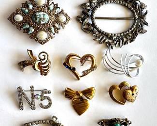 9 Vintage Brooch Pins & Belt Buckle By Original By Robert, Coro, Avon, Emmons & More
Lot #: 131