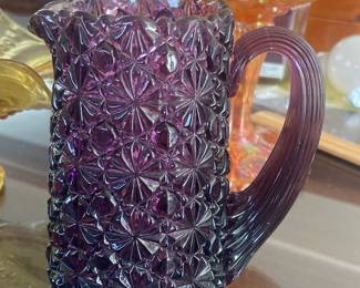 Purple daisy and button pitcher