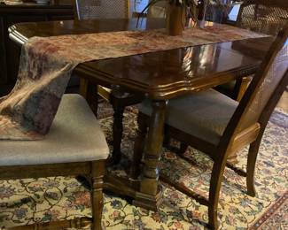 Solid tressel table and four chairs