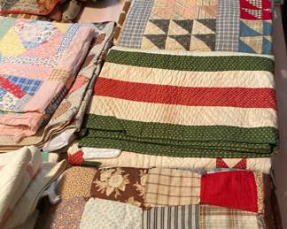 Huge collection of antique hand made quilts