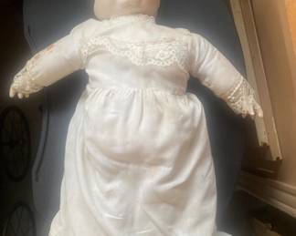 Antique doll with rotating head with 3 faces