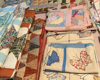 Huge collection of antique hand made quilts