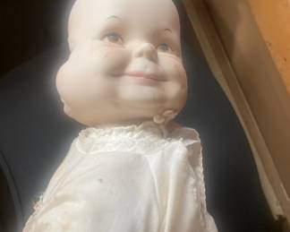 Antique doll with rotating head for 3 faces