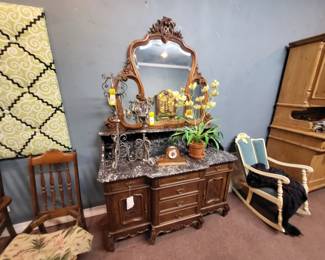 This antique french vanity would make a beautiful sink in a power bathroom.  Notice the lattice work cartouche on the top.