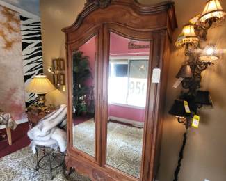 Beautiful french arm walk can easily be converted into a stunning display case by removing the silver on the glass.