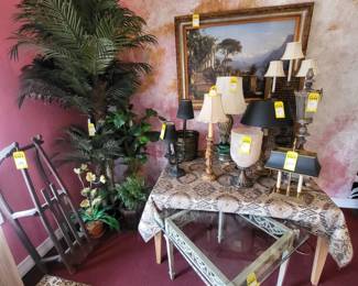 Silk plants and unique items.  Nice iron table with glass top.