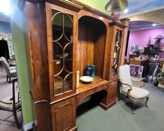 Beautiful credenza for an office would display nicely.  Could also be used as a break front.