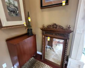 Antique sheet music cabinet, huge barley twist mirror, and unique accessories. 