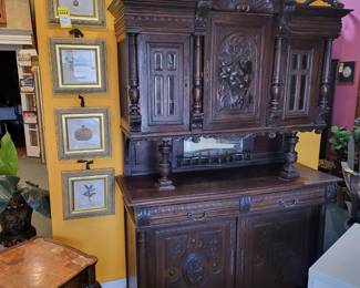 The sideboard will easily fit in any eight foot ceiling room.  You don't find them this short very often.