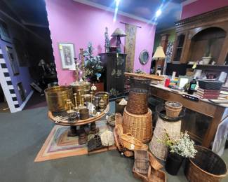 Baskets, brass,  and  a 60's era game table.