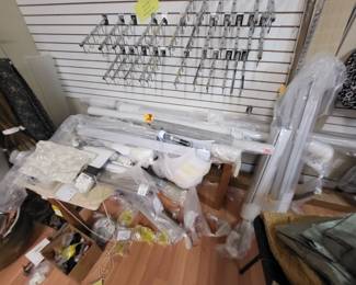 More roller shades.  Slat wall and display hangers. 