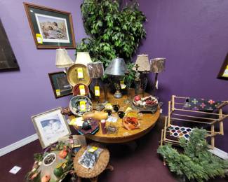Refinished quarter sawn oak 54" inch round table with four leaves expands to over ninety six inches in the race track shape.  More lamps and greenery.