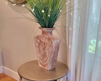 Mirrored end table, vase