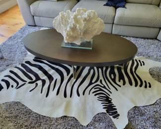 Cow hide zebra pattern rug, coffee table