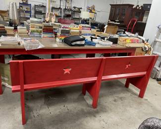 very long outside table with two benches