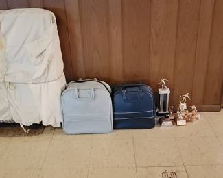 Cot and Bowling Balls and Trophies