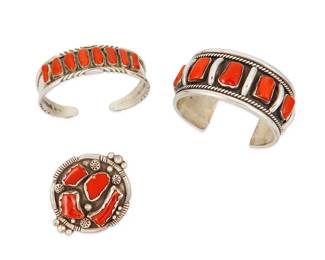 273
A Group Of Southwest Sterling Silver And Coral Jewelry
Three works:
Clyde Davis (b. 20th century, Diné)
Mid/late 20th century
Stamped: C. Davis
A narrow Navajo sterling silver cuff bracelet with incised edges and row set branch coral
6.25" total inner C x 0.75" H, with a 0.75" gap
A group of coral jewelry
Mid/late 20th century
Each appears unmarked
Two works comprising a chunky shadowbox-style silver cuff bracelet with five set coral panels (6.5" total inner C x 1.125" H, with a 1" gap), and a large sterling silver set coral ring with silver ball accents (ring size: 7.5; 2" Dia.), 2 pieces
3 pieces total
127.2 grams gross
Estimate: $600 - $800