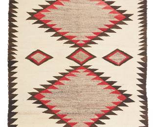 95
A Navajo Regional Rug/Saddle Blanket
Mid-20th century, Diné
With two central serrated diamonds and a sawtooth border to two sides, woven in red, dark brown, grey, and cream wool
46.5" H X 37.5" W
Estimate: $150 - $250