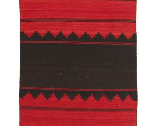 80
A Navajo Small Dress Panel
Circa 1900, Diné
The panel comprising one half of a dress, finely woven in red and brown wool with alternating stepped and striped banding
36.5" H x 24.5" W
Estimate: $700 - $900