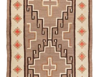 96
A Navajo Regional Rug
Early 20th century, Diné
Woven in cream, red, light and dark grey, and dark brown wool with two central conjoined stepped hooked diamonds and a red cross motif border
91" H x 51" W
Estimate: $1,000 - $1,500