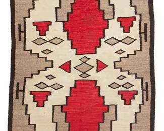 102
A Navajo Regional Rug
Early 20th century, Diné
Woven in red, cream, grey, and dark brown wool in a stylized stepped X motif and with banded ends
56.5" H x 42" W
Estimate: $500 - $700