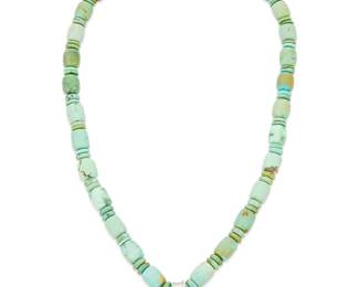 241
A Victor Beck Navajo Turquoise Pendant Necklace
Victor P. Beck, Sr (1941-2022, Diné)
Etched signature verso
A single strand turquoise necklace with alternating barrel and disc beads with a delicate stone set sterling silver pendant
16.25" L x 1" H
44.2 grams gross
Estimate: $500 - $700