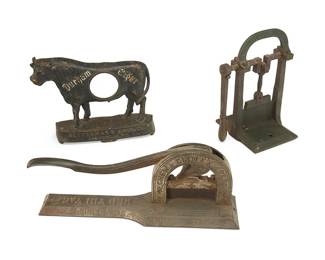 211
A Group Of Cast Iron Tobacco Tools
Late 19th century
One marked in the casting: Wilson & McCallay Tobacco Co. / Middletown Ohio; another marked: Lorillards Climax Plug / Chew Climax Plug; clock advertisement marked: Durham Cigar / Hettermann Bros. Co. / Louisville, NY
Comprising two countertop tobacco plug cutters and a (Bull) Durham Cigar advertisement clock surround, 3 pieces
Longest: 6.5" H x 17.375" W x 4.25" D; Bull: 9.375" H x 12" W x 2.625" D
Estimate: $400 - $600