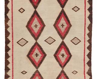 98
A Navajo Regional Rug
Mid-20th century, Diné
With two columns of stacked diamonds and an elaborate stepped border woven in red, brown, grey, and cream wool
85" H x 55" W
Estimate: $500 - $700