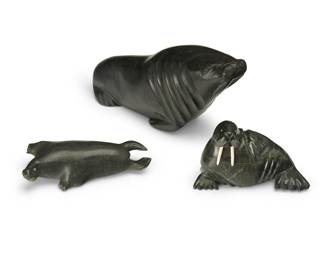 299
Three Inuit Carved Stone Animal Figures
Three works:
Noah Nowrakudluk (b. 1916, Inuit; Port Harrison/Inukjuak)
A carved stone walrus figure, 1978
Signed syllabically and dated to underside and with partial sticker; further marked: 5-91424
The walrus with incised whiskers
5.5" H x 10.25" W x 3.5" D
Sima Tuki (1911-1967, Inuit; Port Harrison/Inukjuak)
A carved stone seal figure, mid-20th century
Signed syllabically and with artist's disc number: E9-927
The seal with sgraffito whiskers, eyes, and flipper details
1.75" H x 6.75" W x 3" D
A carved stone walrus figure, 2009
Signed syllabically to underside, with date: AD 2009
Possibly Alivaqtu Pitulusi (b. 20th century, Inuit; Iqaluit, Nunavut), the seated walrus with bone tusks and sgraffito whiskers
3.625" H x 6.125" W x 2.75" D
3 pieces
Estimate: $600 - $900