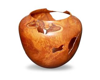 63
Clay Foster (B. 1954)
A large turned wood bowl, 1989
With burn etched signature and date to underside: C. Foster / 89
The high-shouldered bowl with natural gaps and ragged edges inherent in the material
14.25" H x 16.125" Dia.
Estimate: $300 - $500