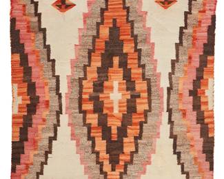 101
A Navajo Regional Rug
Early/mid-20th century, Diné
A stepped concentric diamond motif to center woven in red, orange, cream, dark and light brown wool
64" H x 47.5" W
Estimate: $600 - $800