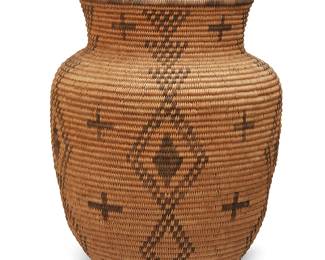 53
An Apache Olla Basket
Early/mid-20th century; Southwestern United States
A tall coiled olla with five columns of conjoined diamonds and floating crosses
10.25" H x 9" Dia.
Estimate: $800 - $1,200