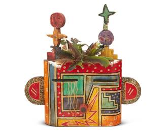 19
Gregory Lomayesva (B. 1971)
A Hopi Shalako-style katsina mask, 1997
Signed and dated verso: Gregory Lomayesva / 97
The polychrome painted carved wood mask surmounted by two smaller figures, decorative feathers, and a leather strap, with woven red yarn fixed verso
17" H x 17" W x 5" D
Estimate: $500 - $700