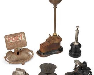 208
A Group Of Tobacco Paraphernalia
Late 19th/early 20th century
One marked: Poet / None Better / Joseph F. McGreenery, Maker / Boston, Mass.; another marked: Captain Marryat Cigars / Harburger Homan & Co. Makers N.Y.; another marked: MF'd by the Oneida Specialty Co / Oneida N.Y.; another marked: The Runhof Mfg. Co.
Comprising six cigar cutters, one with lamp lighter, one with rolling tray, 6 pieces
Largest: 20" H x 8.75" W x 5.25" D; Smallest: 2" H x 4.5" W x 2.375" D
Estimate: $400 - $600