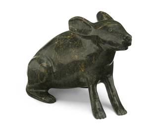 288
Kellipalik Qimirpik (1948-2017, Inuit; Cape Dorset/Kinngait)
A carved stone hare figure, late 20th/early 21st century
Incised signature to underside: K. Qimirpik
The hare figure depicted seated on hind legs, with incised eye details
7.25" H x 10.75" W x 5.875" D
Estimate: $600 - $900