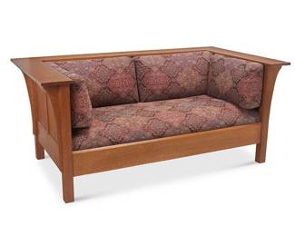 68
A Stickley "Prairie Loveseat," No. 89-210
1993; Manlius, NY
With piecrust Stickley burn mark and metal tag bearing the shop mark [joiner's compass]; dated and marked: #35 Fayetteville; further marked: 89-210
The oak wood loveseat from Stickley's nostalgic "Mission" collection, with pegged construction and corbeled flat arms and crest rails raised on flat panels, all joined by a box rail, featuring floral pattern cotton upholstered cushions
29" H x 67.5" W x 37.5" D
Estimate: $800 - $1,200