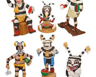 286
A Group Of Hopi Koshare Clown Figures
Mid/late 20th century
Variously signed to undersides: John David Sr. / Finkle Sahmie Hopi Hano Clown / Wilbert Curby "91" Hano Clown / Hano Clown F. Begay / Sitting Hano [illegible signature]
The polychrome carved wood figures, some with leather pouches and accents, comprising a figure holding a chicken by John David Sr. (20th century, Hopi-Tewa), a standing figure holding two slices of watermelon by Finkle Sahmie Nampeyo (b. 1948, Hopi-Tewa), a seated figure holding a slice of watermelon, mouth agape by Wilbert Curby, a standing figure holding a farmer's hoe and watermelon by F. Begay, a seated figure holding a large knife and straddling a watermelon, and a figure standing on a log, mouth agape, 6 pieces
Tallest: 11.25" H x 4.75" W x 4.75" D; Shortest: 6.75" H x 4.75" W x 5" D
Estimate: $300 - $500