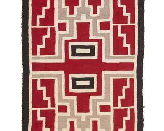 114
A Navajo Regional Rug
Mid-20th century, Diné
Woven in red, cream, light grey, and black wool in a graphic double stepped motif
44" H x 26" W
Estimate: $300 - $500