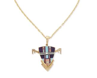 230
A Ray Tracey Navajo 14K Gold And Stone Inlay Pendant
Ray Tracey (b. 1953, Diné)
Late 20th century
Etched verso: Tracey / [above a feather]; chain stamped: 14 KT / Italy
A gold pendant in the form of a stylized katsina face with turquoise, lapis and spiney oyster inlay and textured gold accents, on an associated 14k gold chain
18" L x 2.25" H x 1.875" W
26.4 grams gross
Estimate: $600 - $800