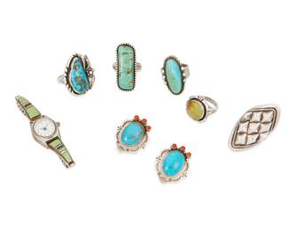 274
A Group Of Southwest-Style Silver Jewelry
Mid/late 20th century
Four stamped for sterling; five further variously marked: PA Smith / Myrtle / JJM / M / Francisco; two unmarked
Seven works comprising two Navajo/Diné set turquoise rings including one by Julia J. Martinez and one by P.A. Smith, as well as a large diamond-shaped sterling silver ring by Ellen Myrtle and two further set stone rings (largest: ring size: 9; smallest: ring size: 6.25), together with a pair of set turquoise and coral earrings (each: 1.125" H), and a watch with sterling silver tapered sections of inlaid stone to band including turquoise and opal, by Francisco (7" C x 0.875" W, inlay: 0.375" H x 1" W), 8 pieces
88.1 grams gross
Estimate: $300 - $500