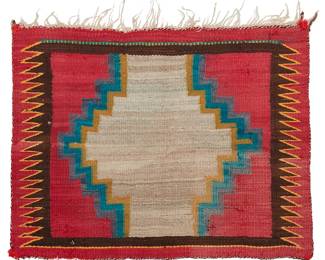 82
A Navajo Saddle Blanket
Late 19th/early 20th century, Diné
With a stepped cross center, sawtooth border to short ends, and fringe to one long edge, woven in multicolored wool
35" H x 27.75" W
Estimate: $400 - $600
