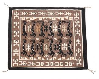 138
A Navajo Two Grey Hills Pictorial Textile
Likely Esther Etcitty (b. 1944, Diné)
Late 20th/21st century, Diné
Woven in grey, cream, black, and tan wool with multiple Kokopelli and rock art figures and an elaborate pictorial border
45" H x 57" W
Estimate: $1,000 - $1,500
