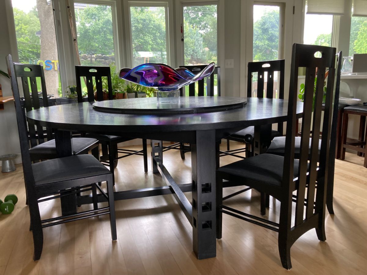 Charles Rennie Mackintosh design by Cassina Furniture of Italy. 6ft. Round table with drop down lazy susan and 8 chairs.