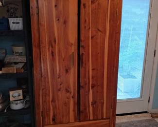 Large upright, cedar armoire  in very good condition