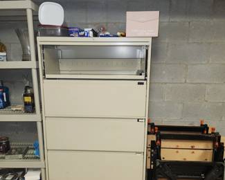 HEAVY, weighted bottom five drawer lateral file cabinet.  BRING HELP TO MOVE.  Located in the garage for easy removal