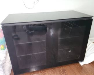 dark glass stereo cabinet