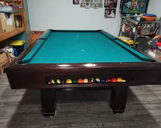 Full sized pool table by Brunswick Billiards,  w ping pong top. AVAILABLE FOR PRE-SALE.  $750.00 OBO